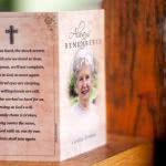 Old paper style memorial card design with blended in photo on the front