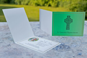 Green folding acknowledgement card with Celtic cross