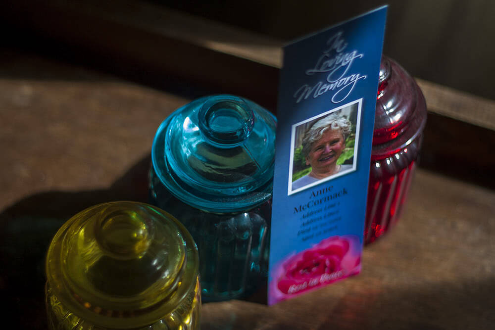 Memorial bookmark with red rose at the bottom