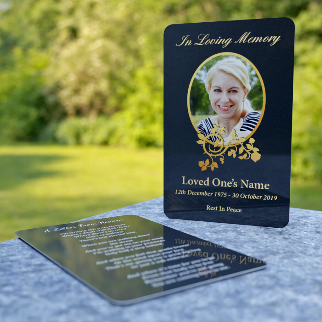 MPW-20 Wallet Memorial Card with dark background and decorative golden floral pattern. Outdoors, 3d render.