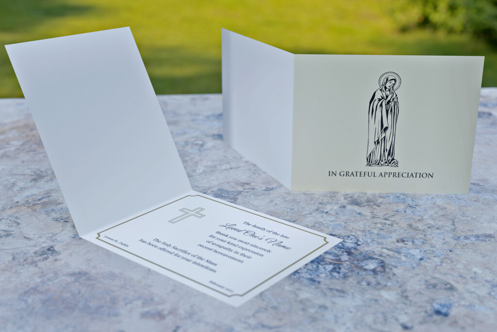 Folding acknowledgement card with drawing of Virgin Mary on the front